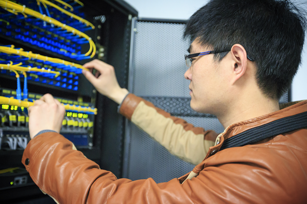 Man working on server hardware