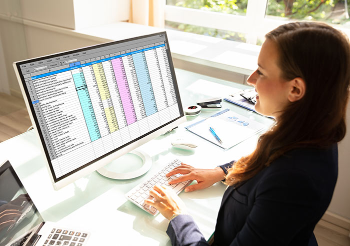 woman and spreadsheet